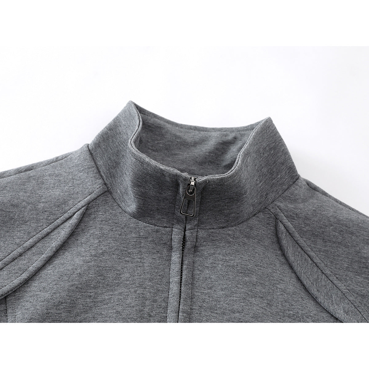 Close-up of a heather gray jacket's tall stand collar and front zipper.