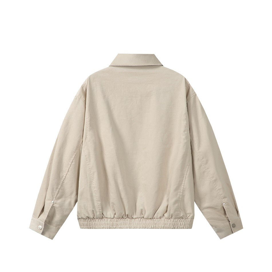 Back view of a light beige collared jacket with long sleeves, buttoned cuffs, and an elasticated hem.