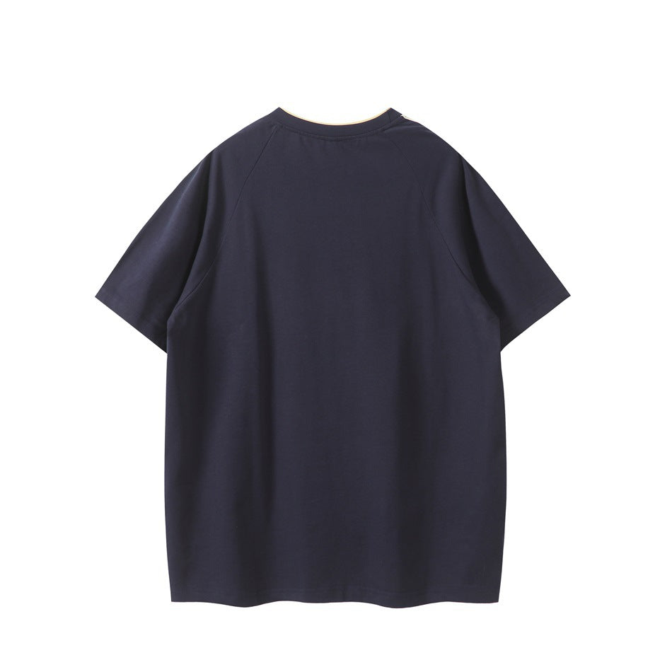 Back view of a plain navy short-sleeve T-shirt with raglan sleeves and pale trim at the neckline.