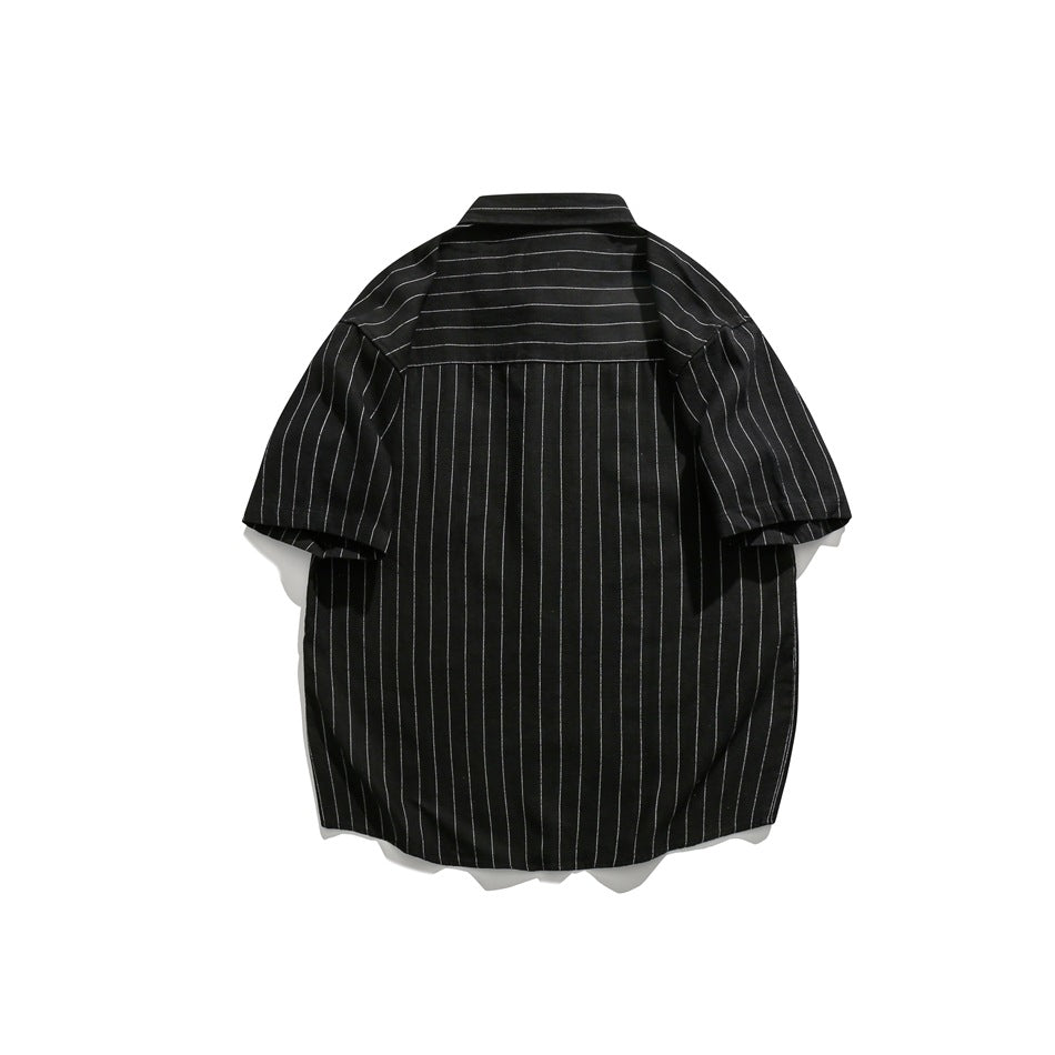 Back view of a black short-sleeve button-up shirt with thin white pinstripes and a yoke.
