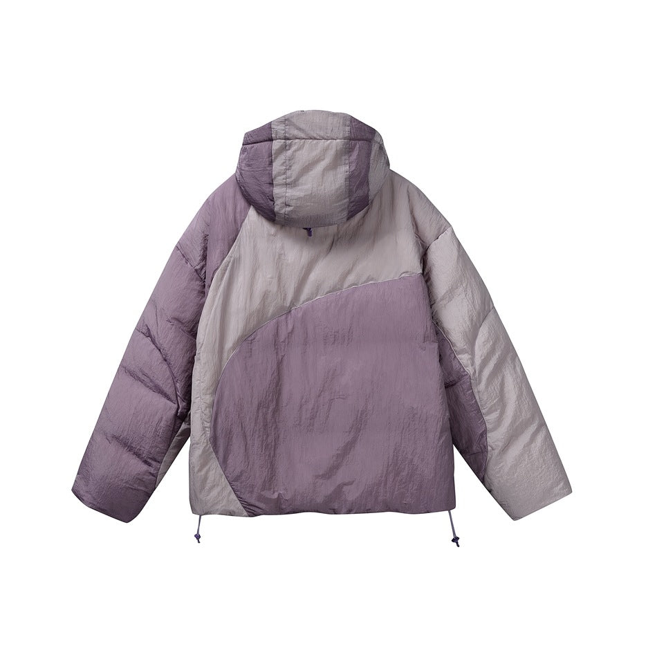 Rear view of a two-tone padded hooded jacket in muted lavender and light gray, with a curved color-blocked panel and hem