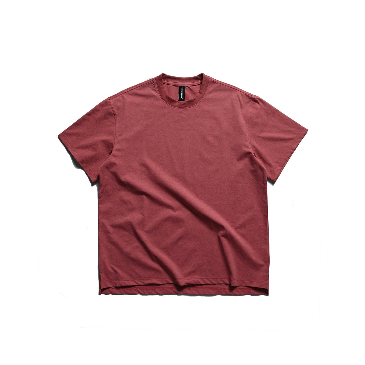 Watermelon red short-sleeve crew neck T-shirt laid flat, front view, with ribbed collar