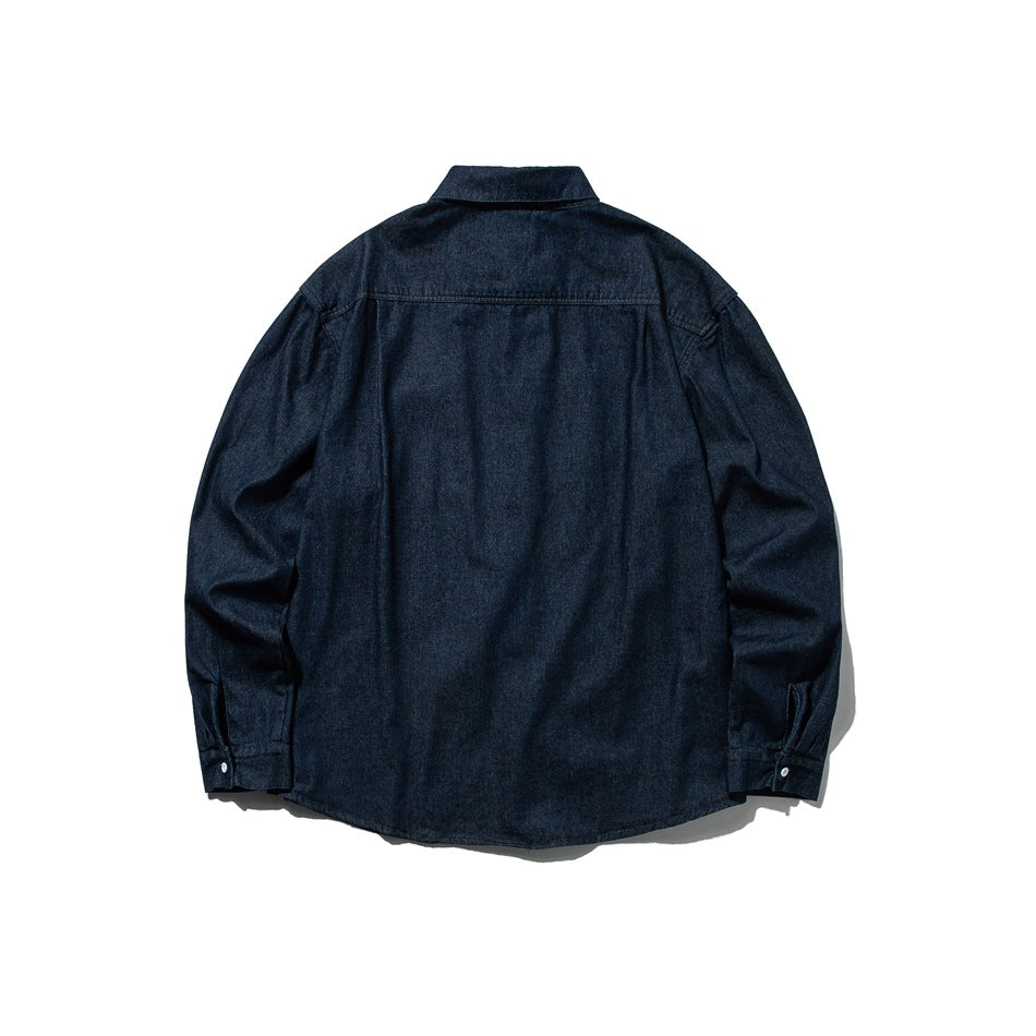 Back view of dark indigo denim long-sleeve shirt showing back yoke seam and button cuffs