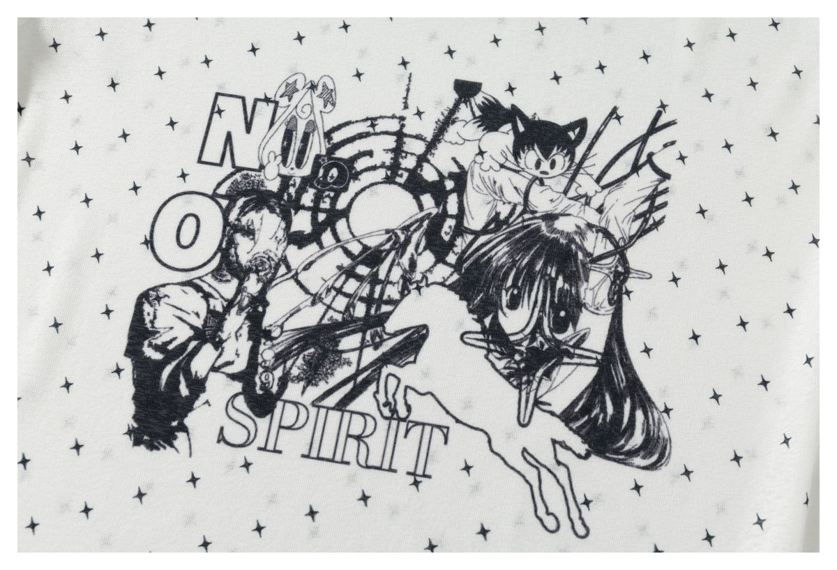 Close-up of black manga-style character artwork and lettering amid scattered stars on a white top.