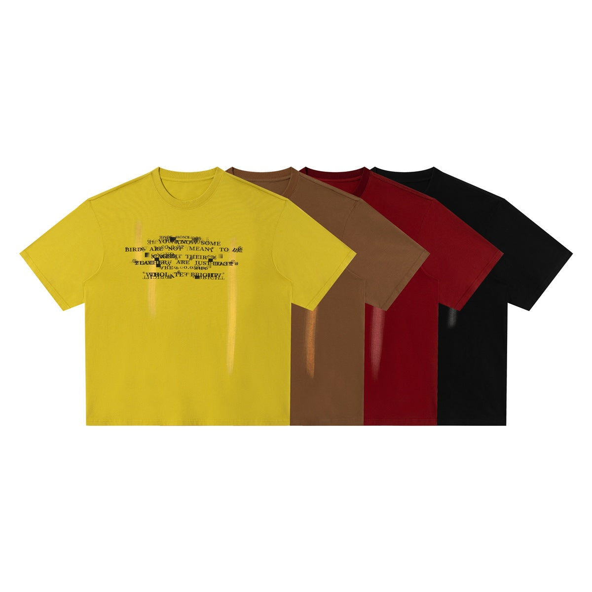 Four short-sleeve crew-neck T-shirts in yellow, brown, red, and black, each with a chest text graphic.