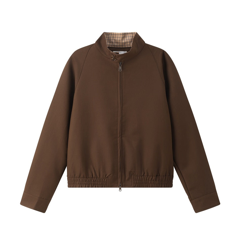 Brown stand-collar zip jacket flat lay with plaid undercollar, raglan sleeves and elastic hem