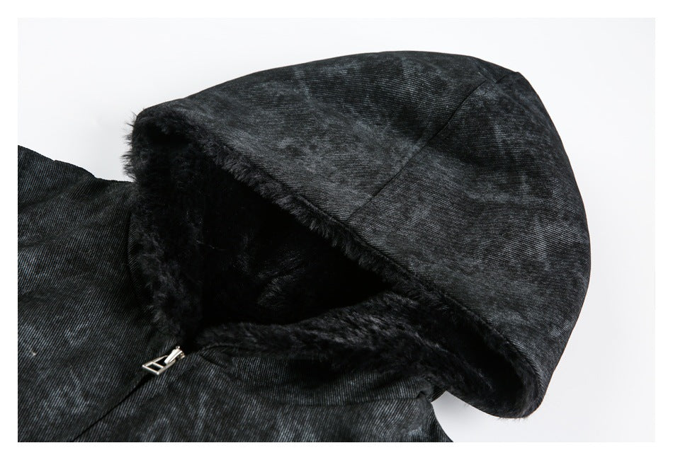 Close-up of the jacket hood, showing its dark fuzzy lining and mottled outer fabric.