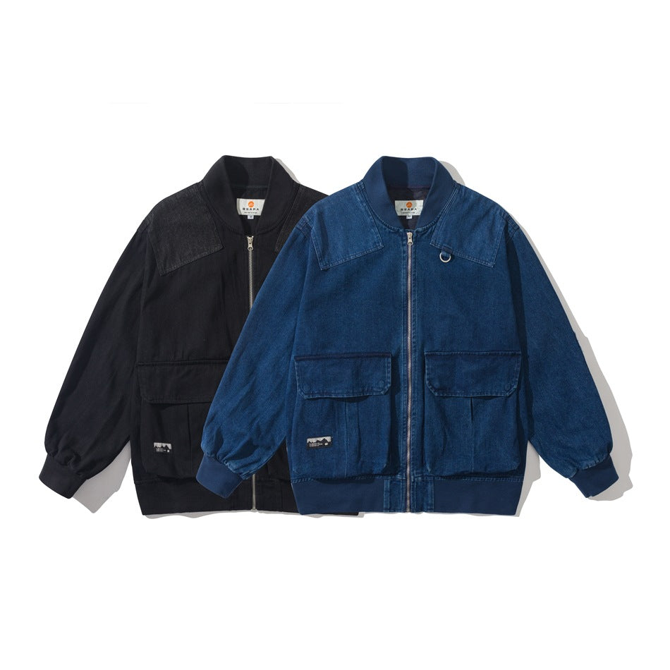 Front view of two zip-up jackets in black and blue, with flap pockets, shoulder panels, and ribbed trim.