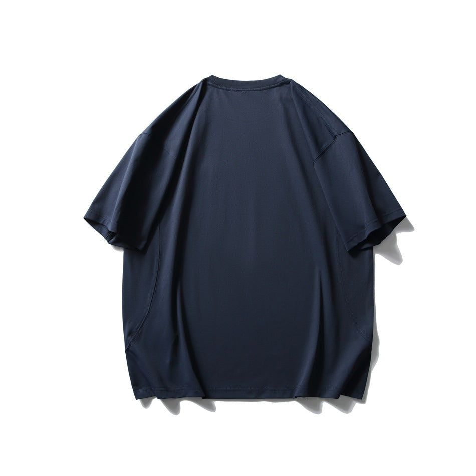 Back view of an oversized dark navy T-shirt with short sleeves on a white background.