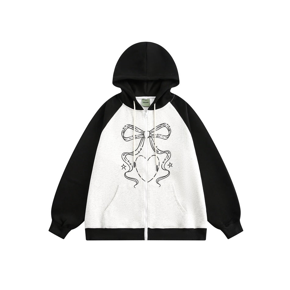 Black and gray zip-up hoodie with black raglan sleeves and a bow and heart line-art print on the front