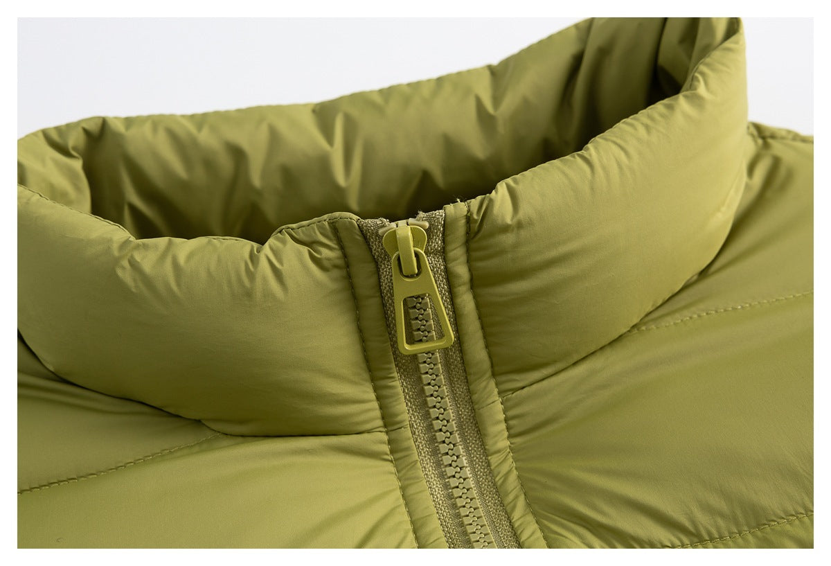 Close-up of an olive-green padded jacket collar and chunky front zipper.