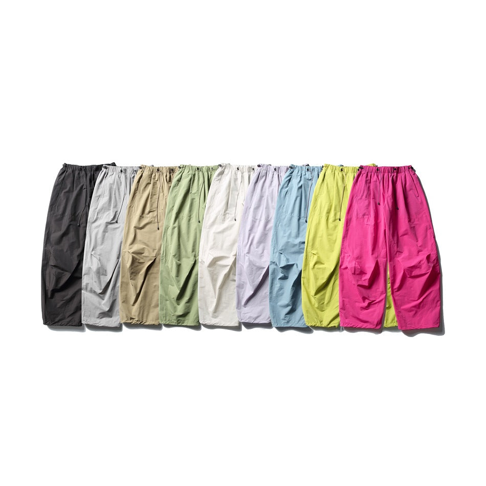 Nine wide-leg parachute pants in black, gray, camel, green, white, lilac, blue, yellow-green and pink