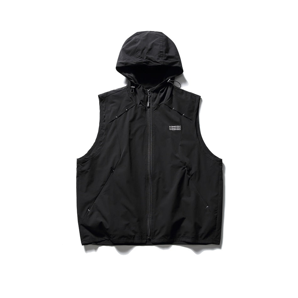Black sleeveless hooded zip vest with drawcord hood, angled side pockets and small chest print, flat lay front view