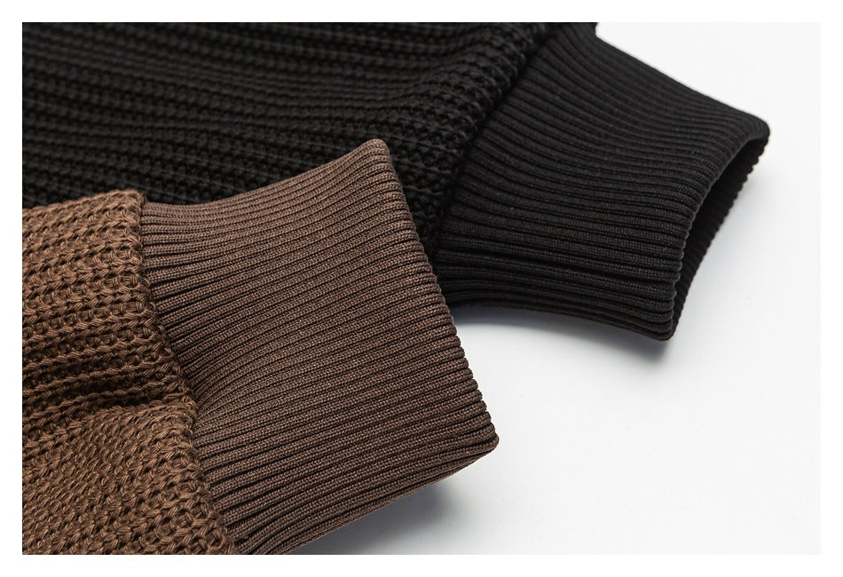 Close-up comparing brown and black knit jacket sleeves with matching ribbed cuffs.