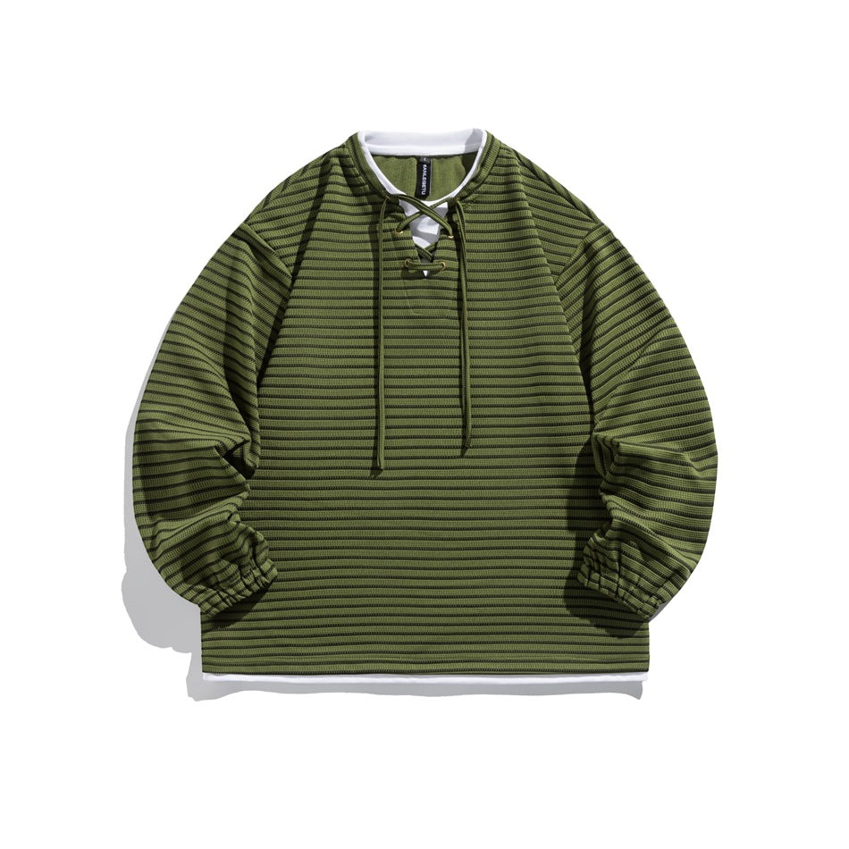 Green striped long-sleeve pullover with lace-up neckline, white layered collar and hem, and elastic cuffs, flat lay