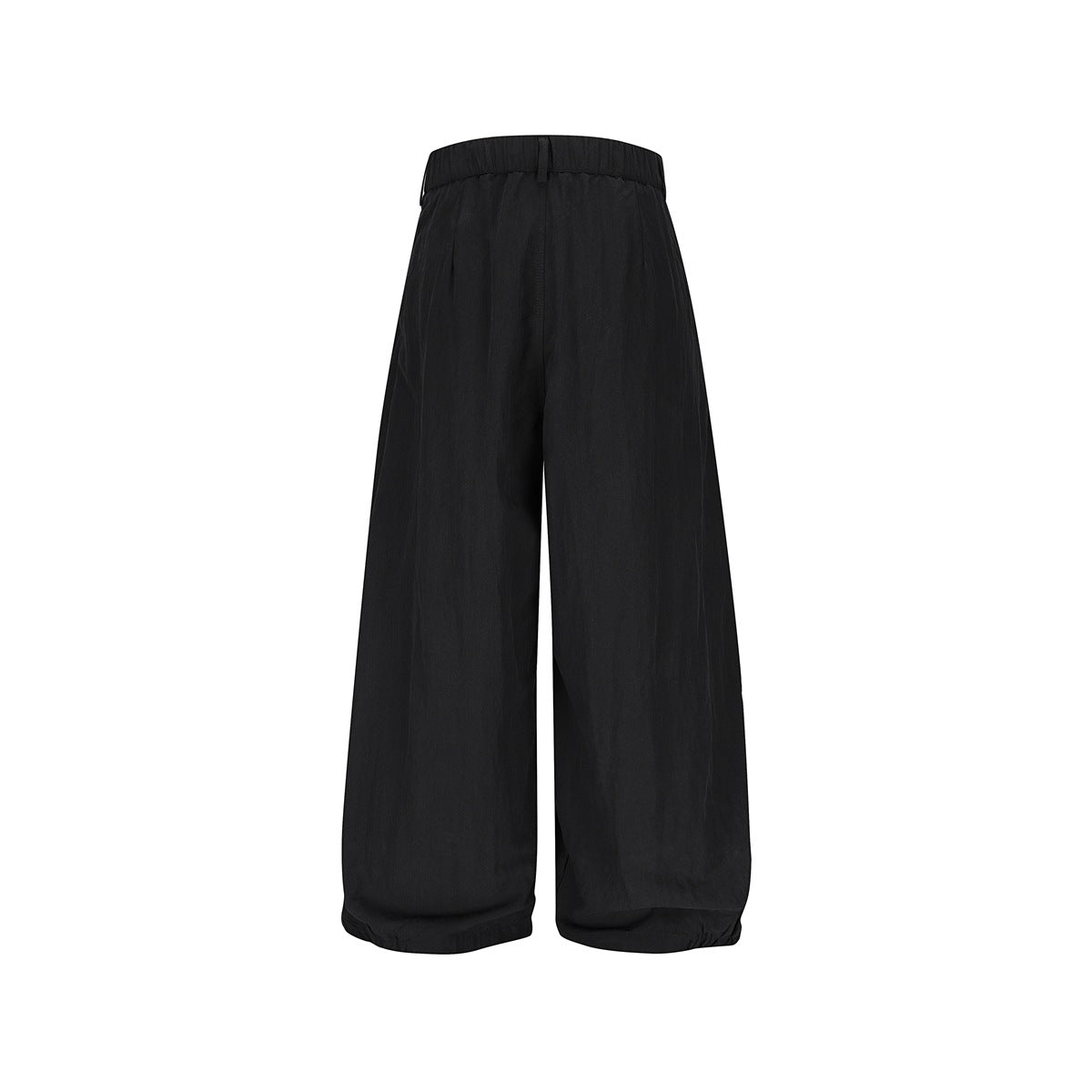 Back view of black high-waisted pants with a very wide-leg silhouette and gathered waistband.