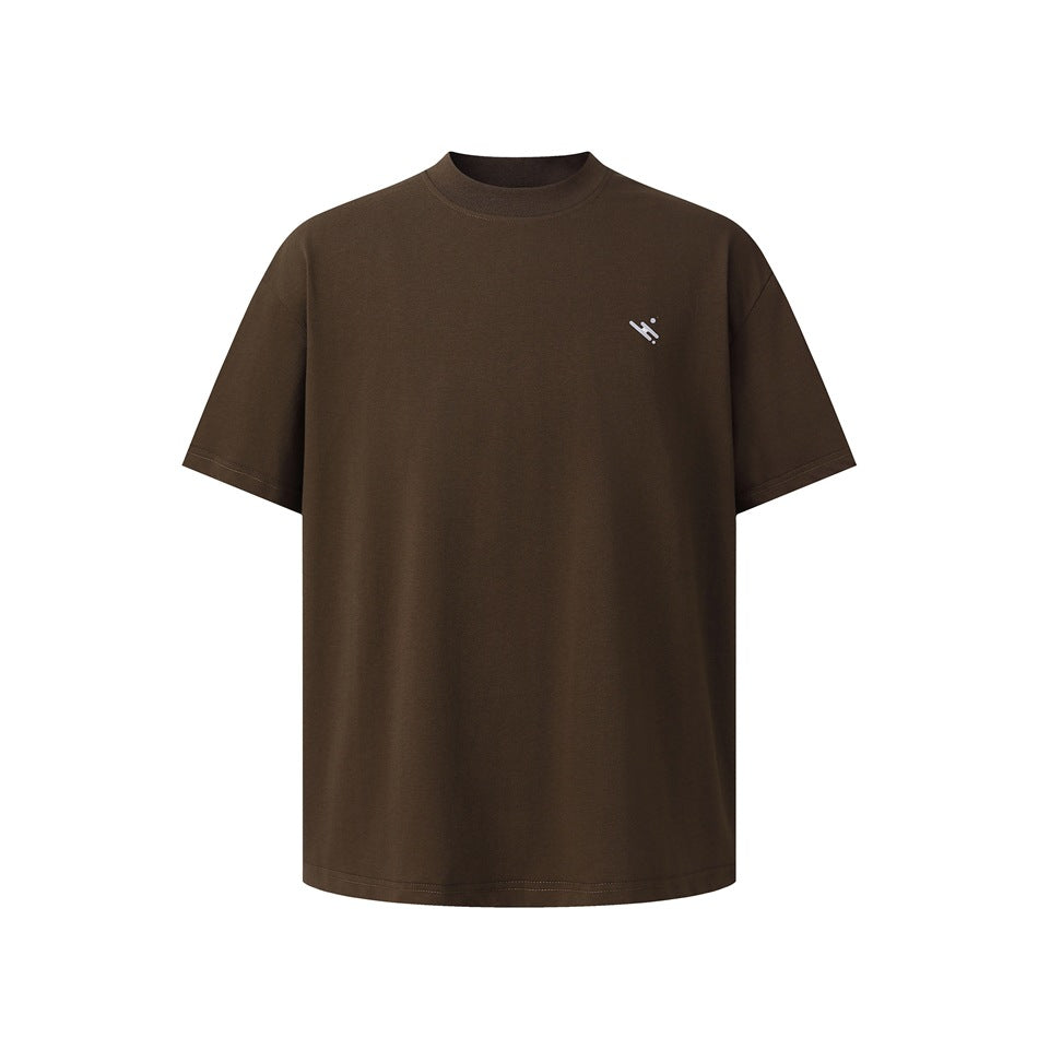 Front view of a dark brown short-sleeve crew-neck T-shirt with a small light mark on the left chest