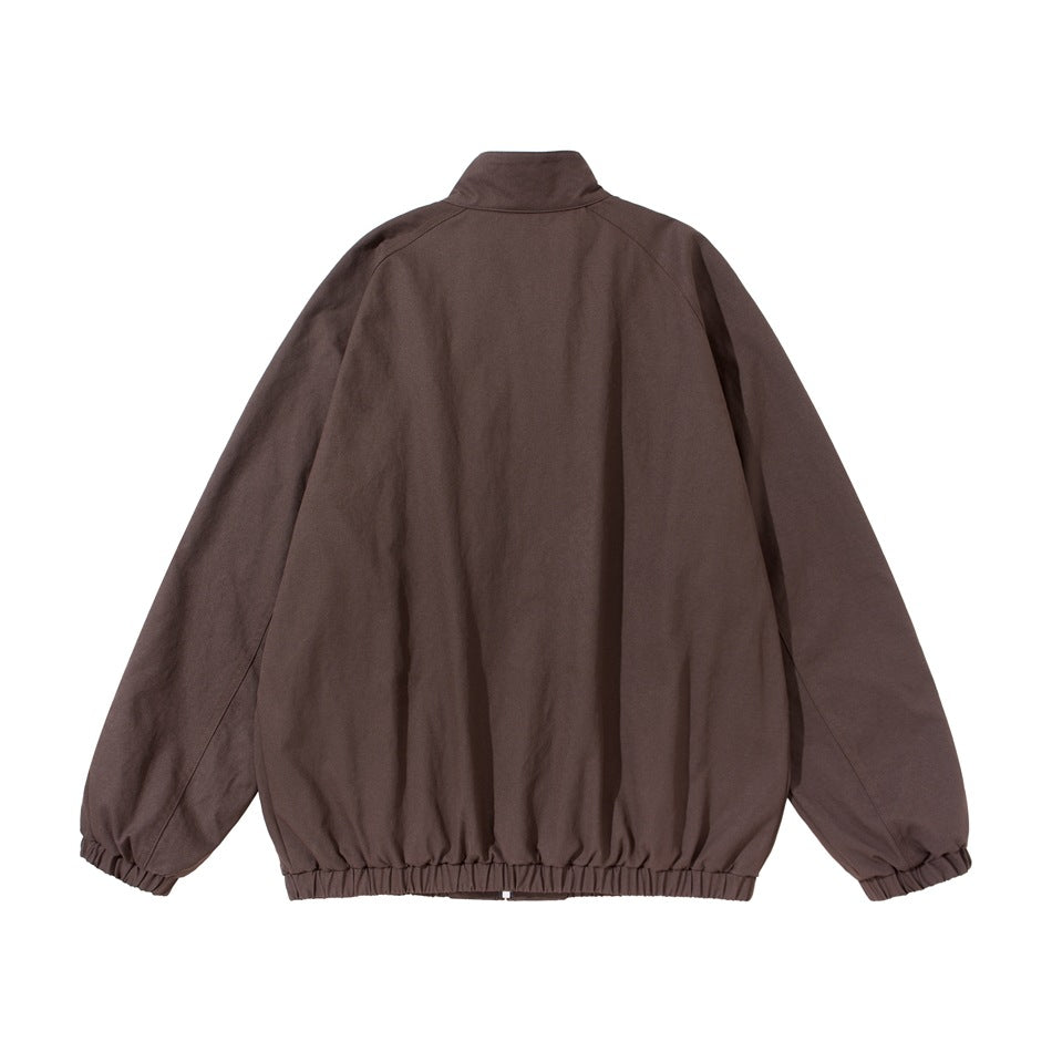 Back view of brown stand-collar jacket with raglan sleeves and elastic cuffs and hem, flat lay