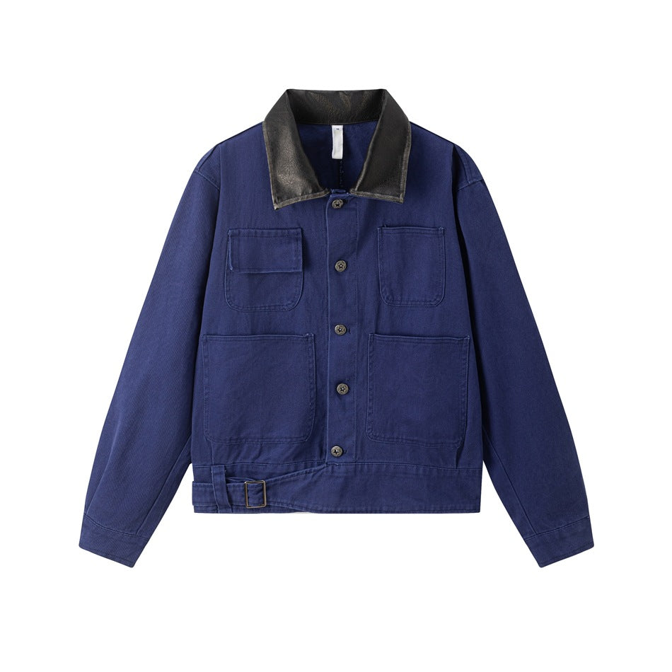 Blue button-front work jacket with black contrast collar, four patch pockets and side hem buckle strap, flat view