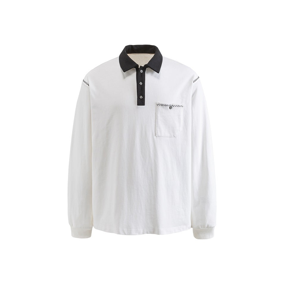 White long-sleeve polo top with black collar and placket, buttoned chest pocket and ribbed cuffs, front flat view