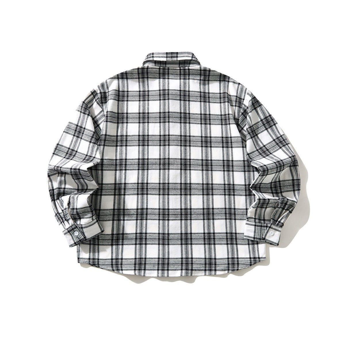 Back view of a black-and-white plaid long-sleeve button-up shirt.
