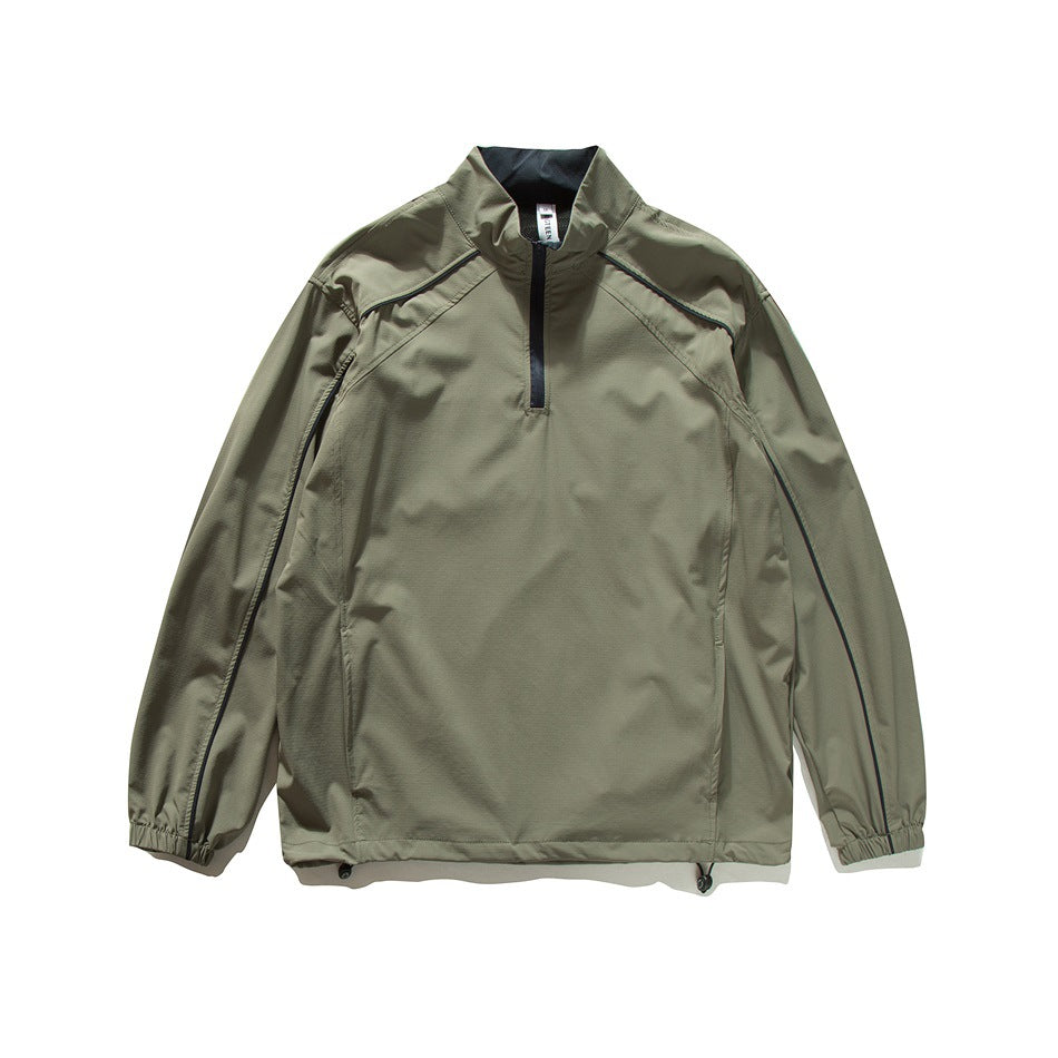 Front view of an olive-gray quarter-zip jacket with a stand collar, black trim, and elastic cuffs.