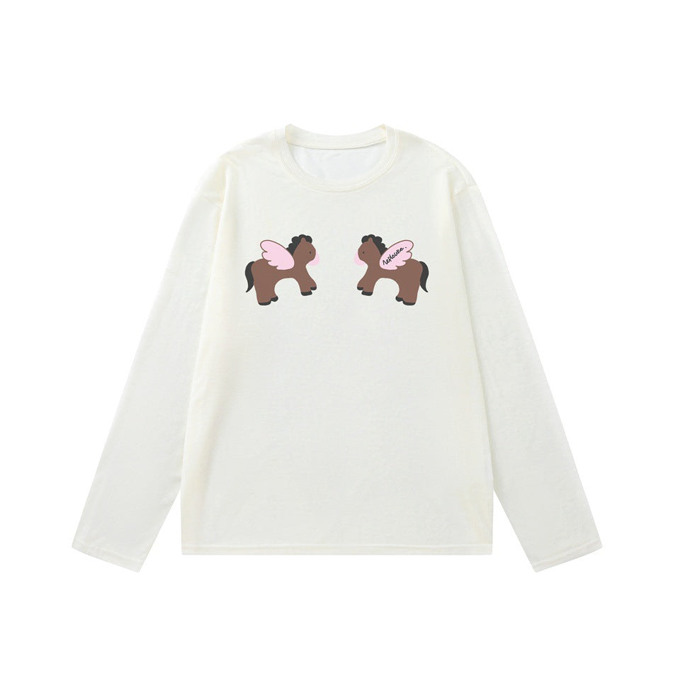 Off-white long-sleeve crew neck top with two mirrored brown winged ponies with pink wings printed on the chest