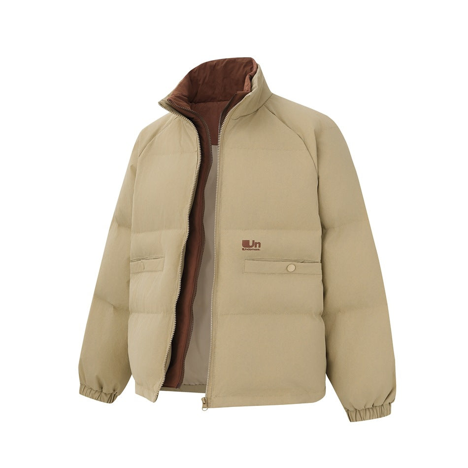 Front view of a beige quilted jacket, partly unzipped to show brown lining, with a high collar and snap pockets.