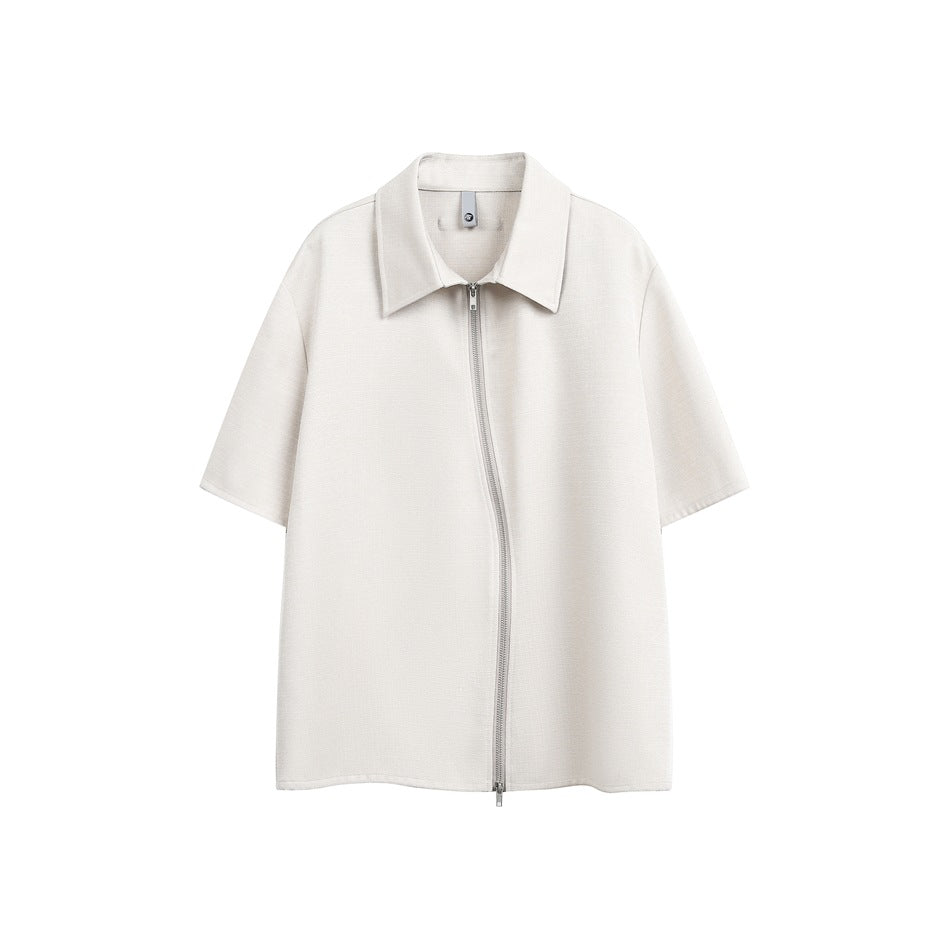 Beige short-sleeve shirt with pointed collar and curved light gray front zipper, flat view