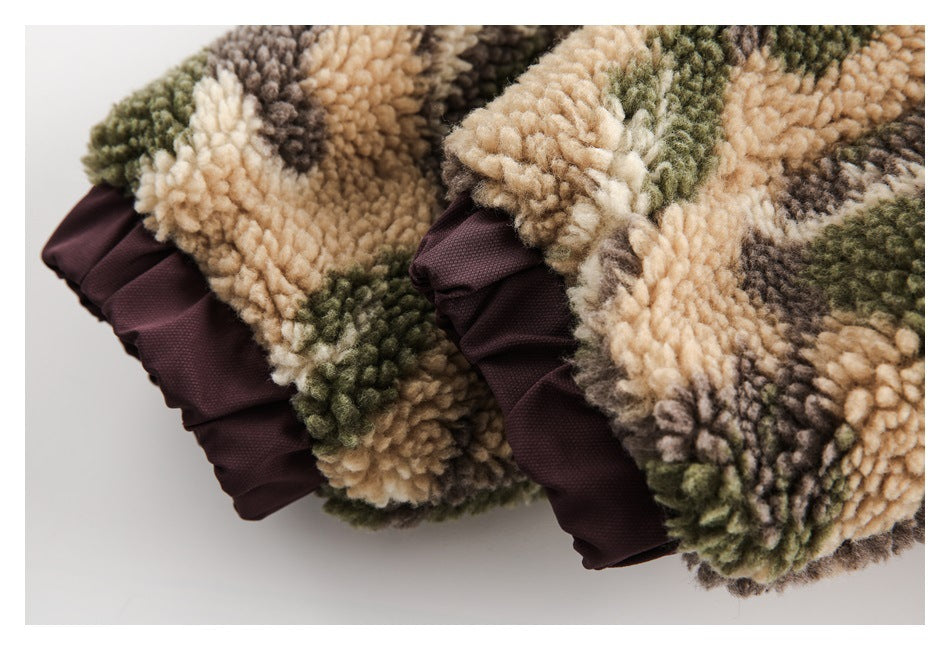Close-up of two fleece edges with dark plum gathered trim and a beige, olive, and gray camouflage pattern.