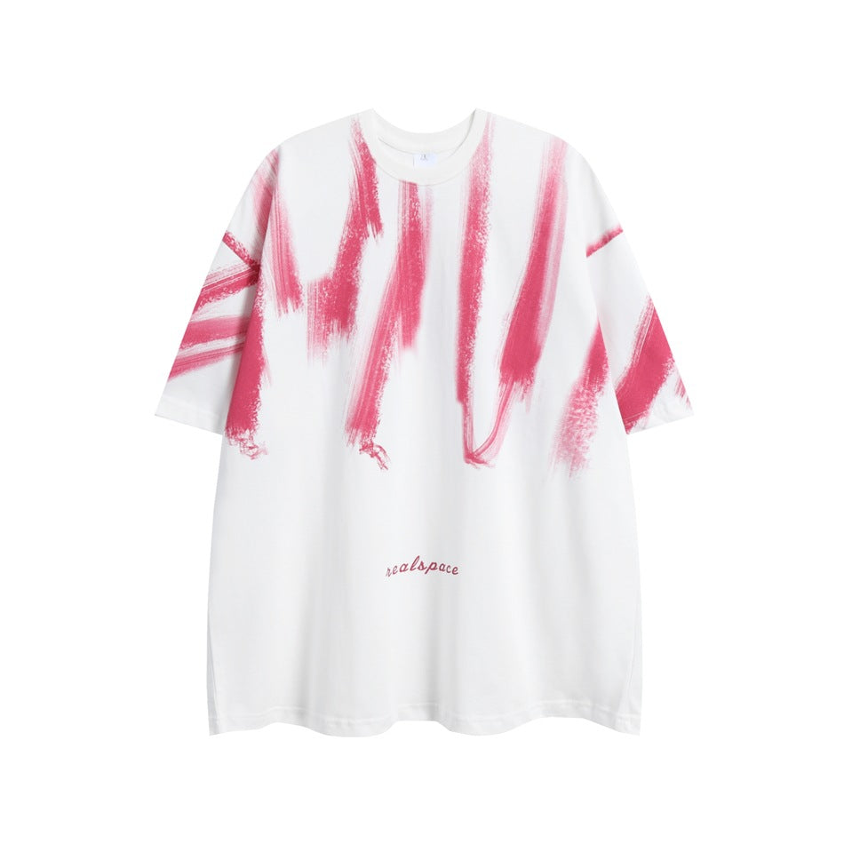 White oversized short-sleeve T-shirt with pink brushstroke print on chest and sleeves, flat front view