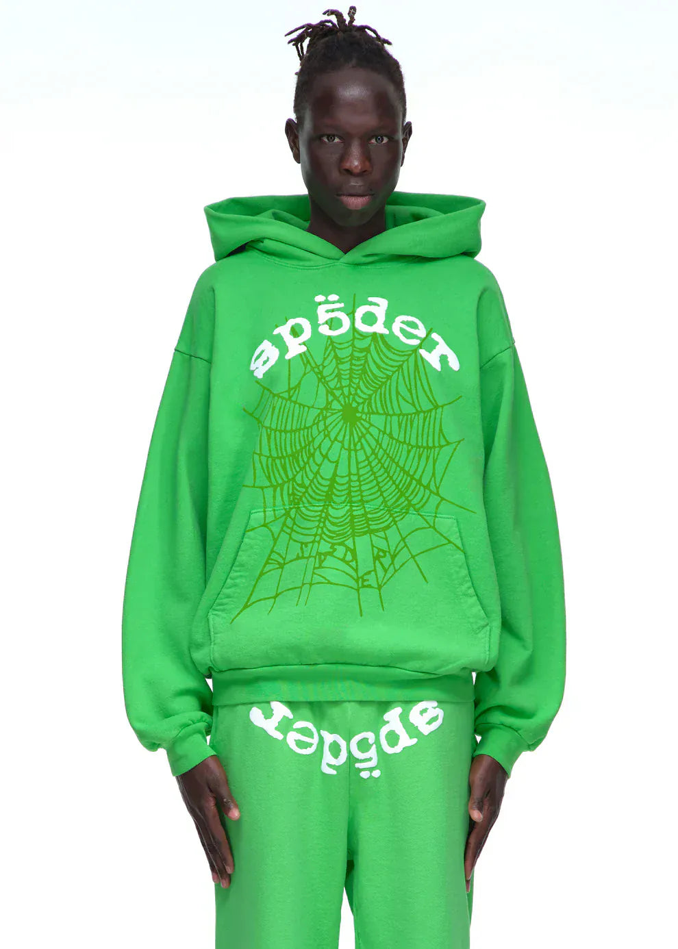 Person wearing the Sp5der “Web Core” Hoodie – Neon Green 440GSM Heavyweight Oversized Streetwear Pullover with a spider web graphic and "spēder" text, showcasing bold streetwear style from the Sp5der Web Core collection.