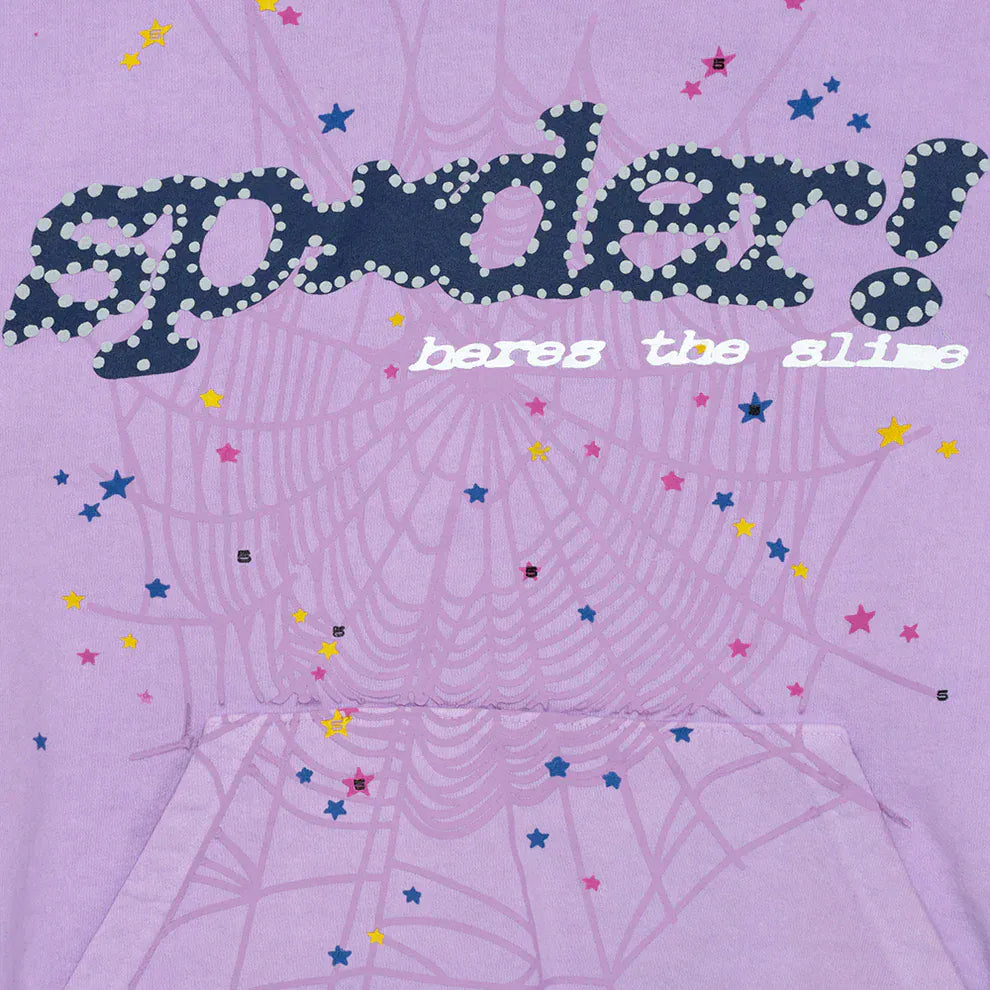 The Sp5der “Hares the Slime” Hoodie in lavender purple is a 440GSM heavyweight streetwear pullover featuring bold "spider!" lettering, "hares the slime" below, a spider-web graphic, and colorful star accents for standout style.