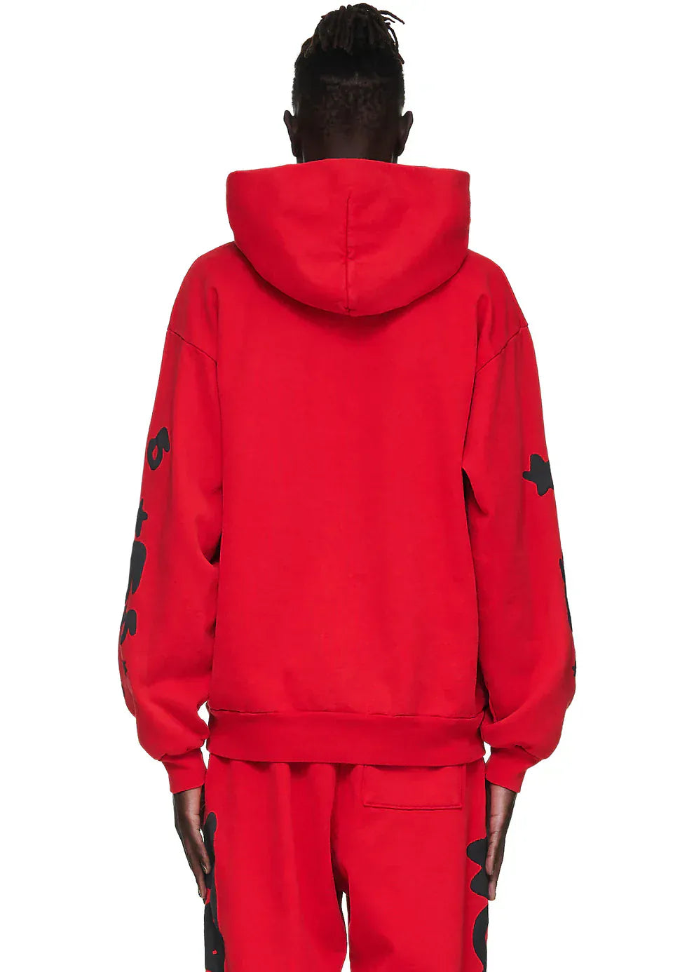 Person shown from the back wearing the Sp5der “Starfire” Hoodie – Red & Black 440GSM Heavyweight Oversized Streetwear Pullover and matching red pants. Black graphic details on sleeves and pants add a bold touch to this cotton fleece look.