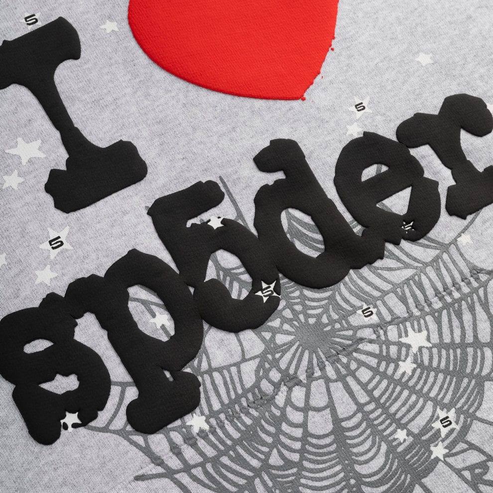 Close-up of the Sp5der “I Love Sp5der” Hoodie – Grey 440GSM, showing "I ♥ spyder" with a red heart, spiderweb, and white stars—a heavyweight oversized streetwear pullover perfect for Y2K fashion lovers.