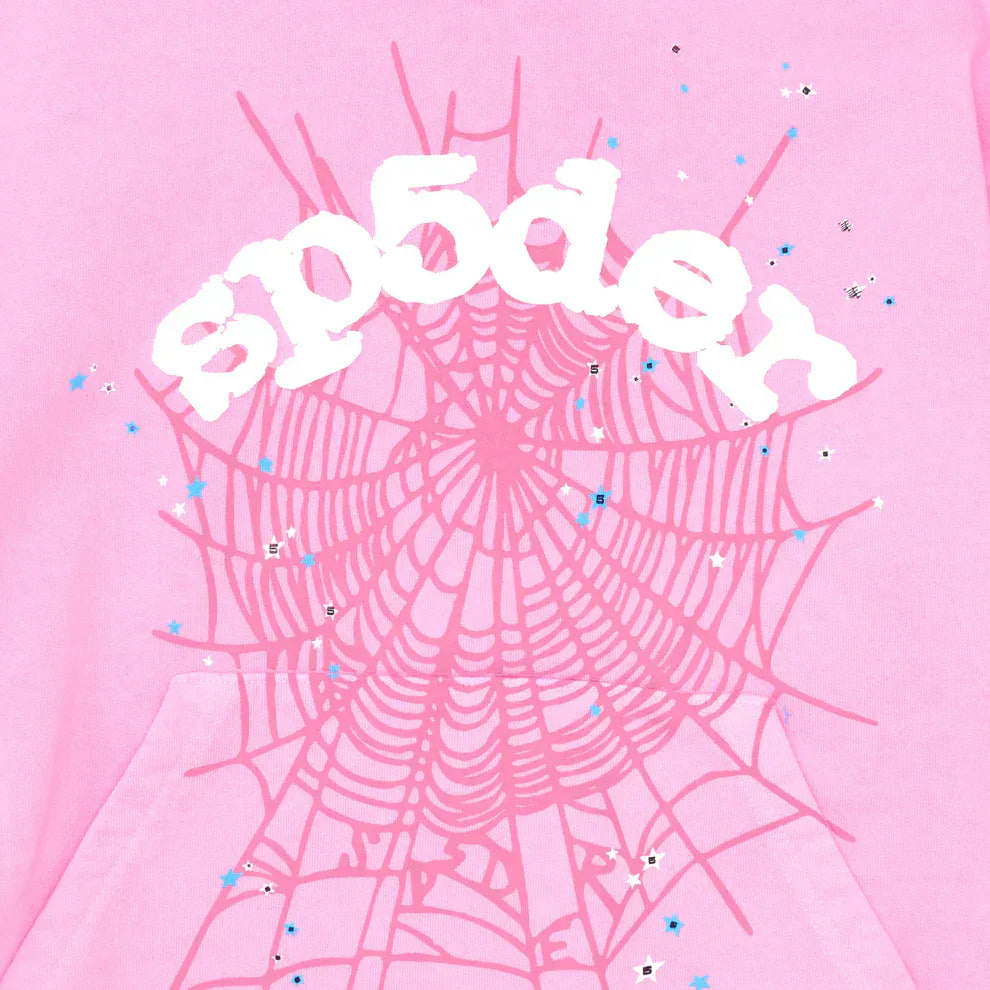 The Pink Graphic Hoodie with Spider Web Print is a comfort fit pullover featuring a white sp5der logo, pink spider web graphics, and star accents—ideal for bold streetwear looks.