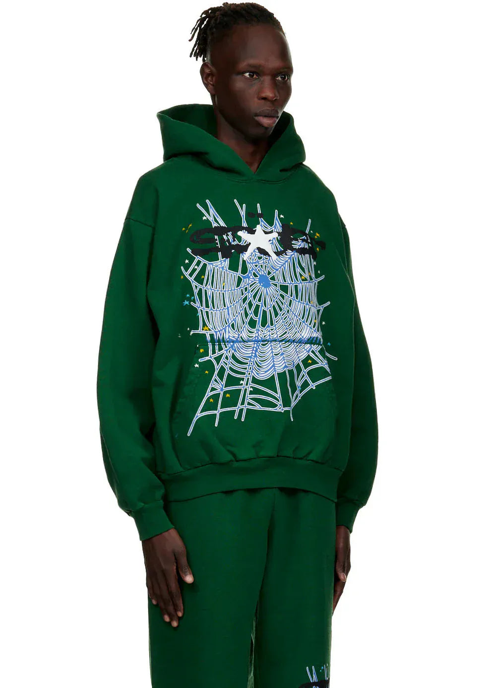 A person wears the Dark Green Graphic Hoodie with Spider Web Print—an everyday comfort-fit pullover featuring bold web graphics and abstract front designs, perfect for a standout streetwear look.