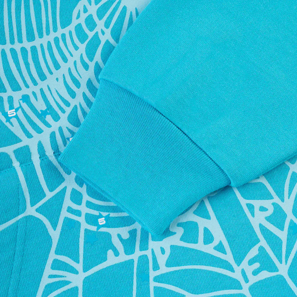 Close-up of the Sp5der “Nevermind the Spider” Hoodie in Sky Blue—crafted from 440GSM heavyweight cotton fleece, with abstract white line patterns and subtle S letters—ideal for streetwear fans.