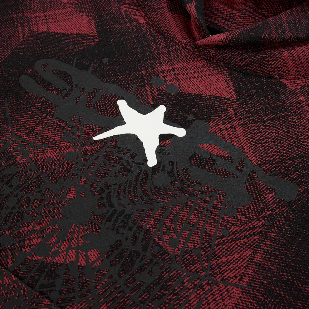 The Red and Black Graphic Hoodie with Star Detail and Spider Web Print features a bold white star graphic on textured fabric, blending comfort fit with striking streetwear style in this pullover hoodie.