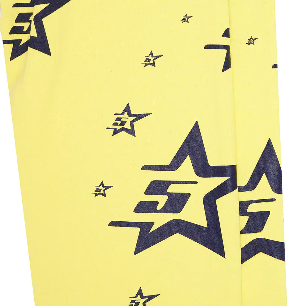 Unisex yellow cotton Sp5der Sweatpants with an all-over black star print, each star featuring an "S"—the perfect standout piece for streetwear style or pairing with your favorite graphic tees.
