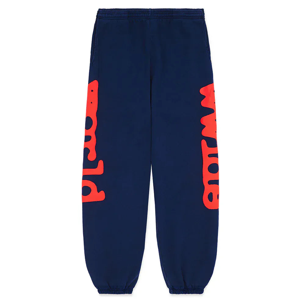 The Sp5der Sweatpants Navy Blue Red Side Logo Print are 100% cotton streetwear jogger pants with an elastic waistband and cuffs, plus bold red logo prints on both legs—ideal for fans of classic jogger style.