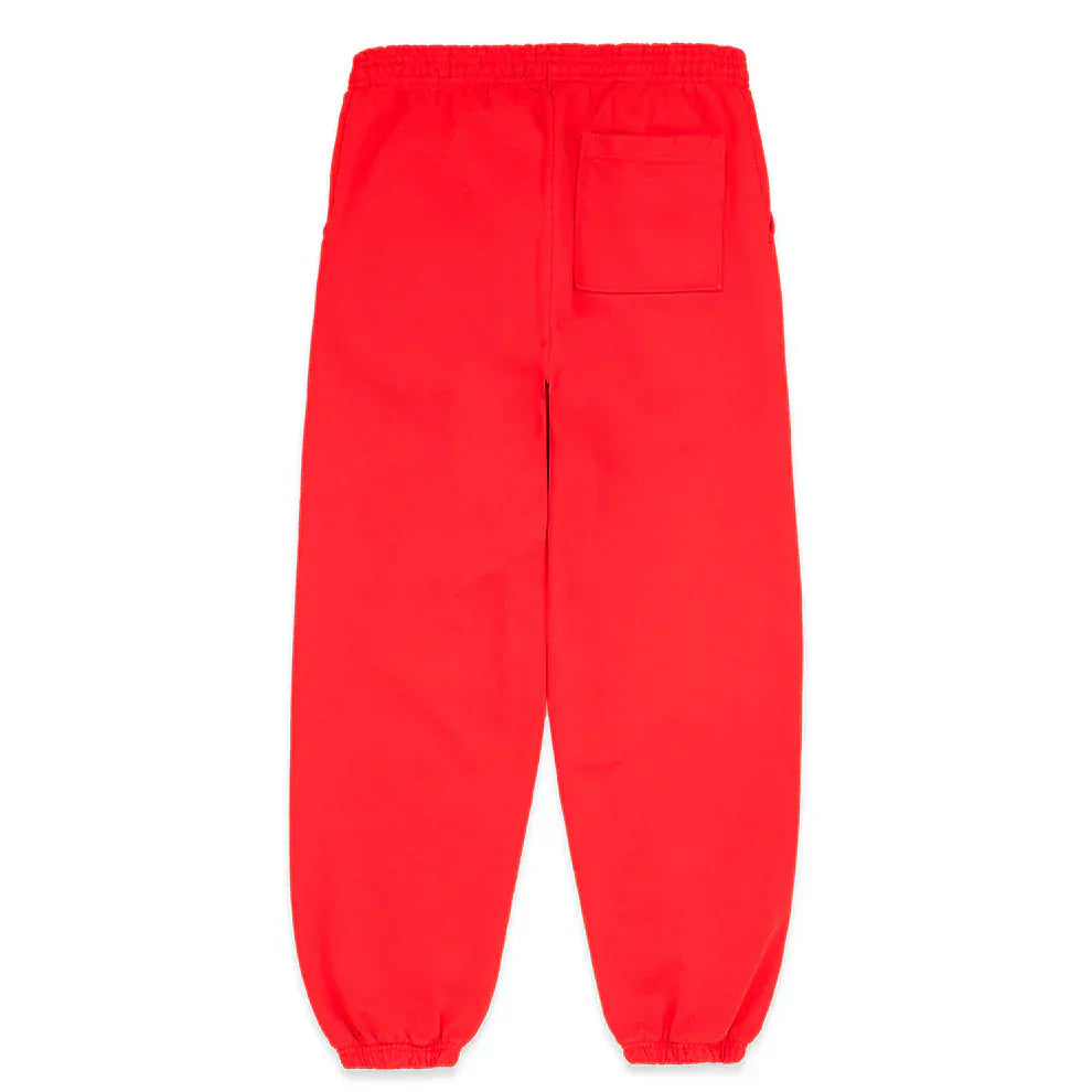 Unisex 100% cotton Sp5der sweatpants in bright red, featuring a relaxed fit, black logo and star graphics, elastic waistband and cuffs, side pockets, and a back patch pocket.