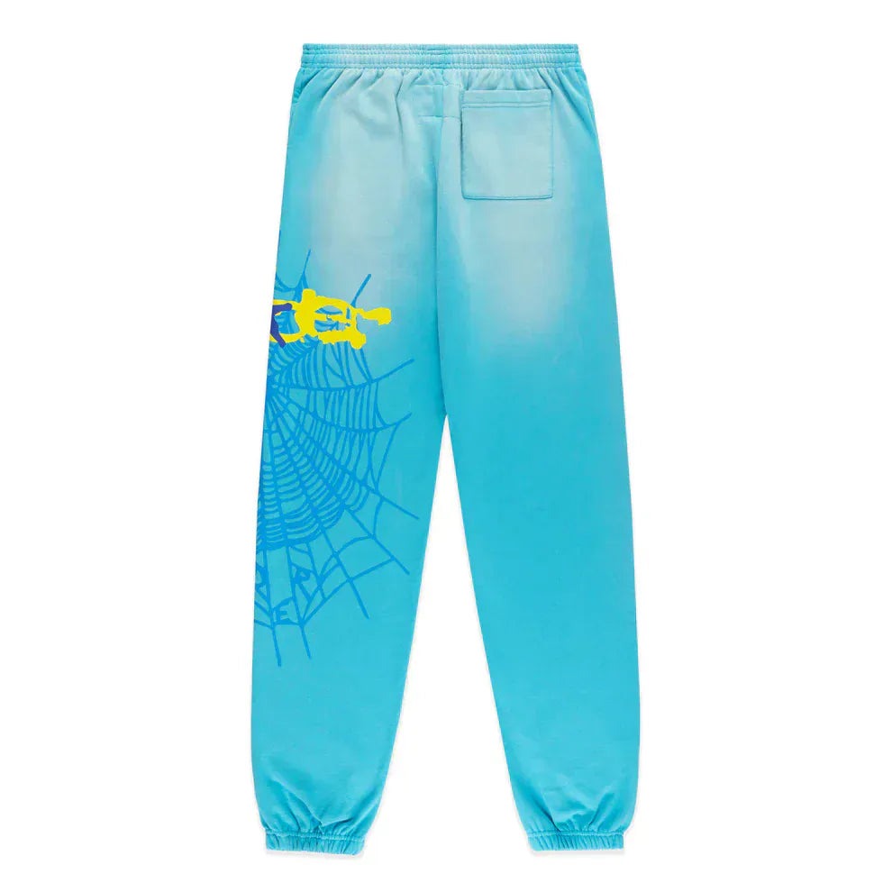 100% Cotton Sp5der Sweatpants – unisex blue joggers with a relaxed fit, elastic waistband and cuffs, spider web graphic, and star details; streetwear inspired by Sp5der sweatpants.