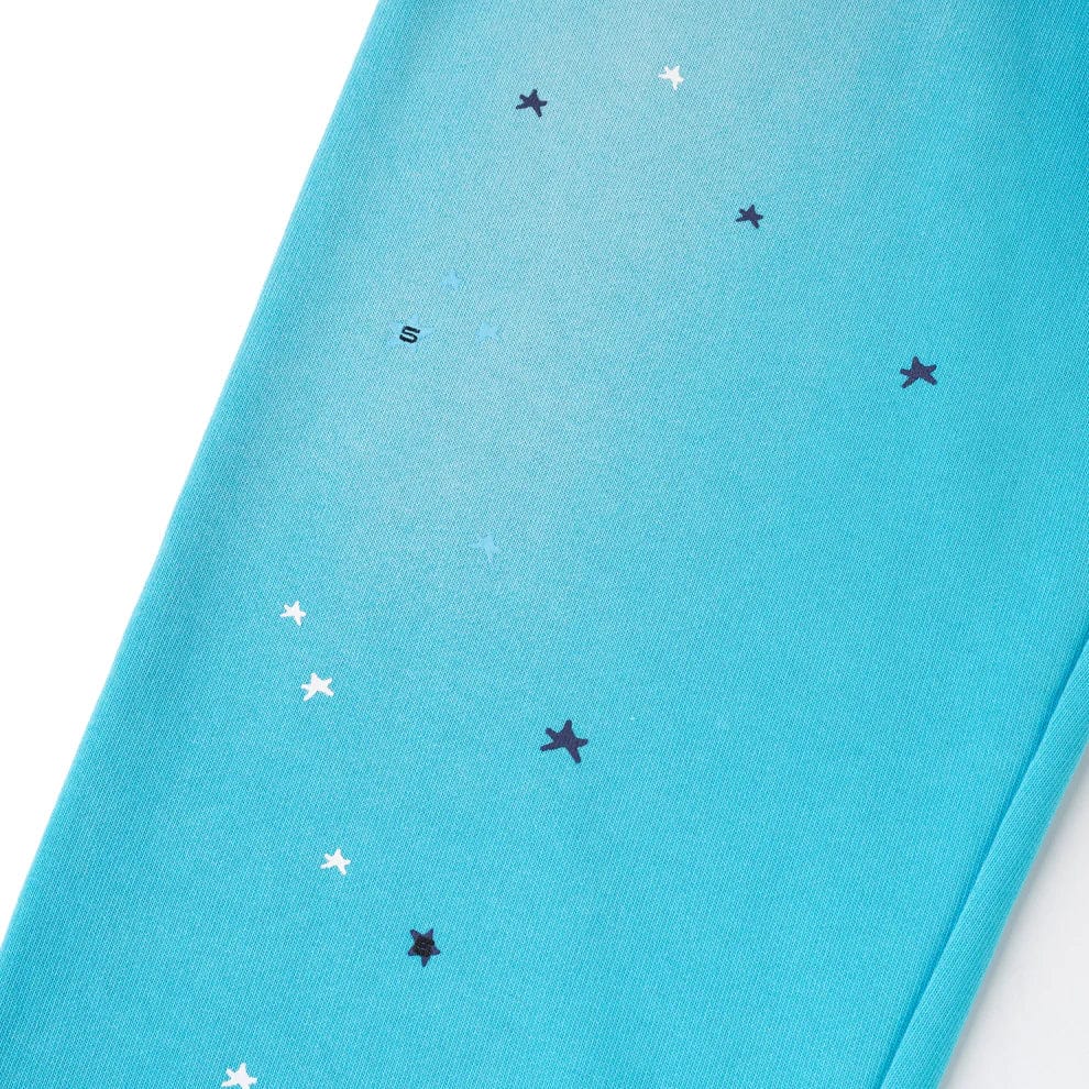 Unisex 100% cotton Sp5der sweatpants—blue jogger pants with a relaxed fit, featuring spider web graphics and star details for stylish streetwear appeal.