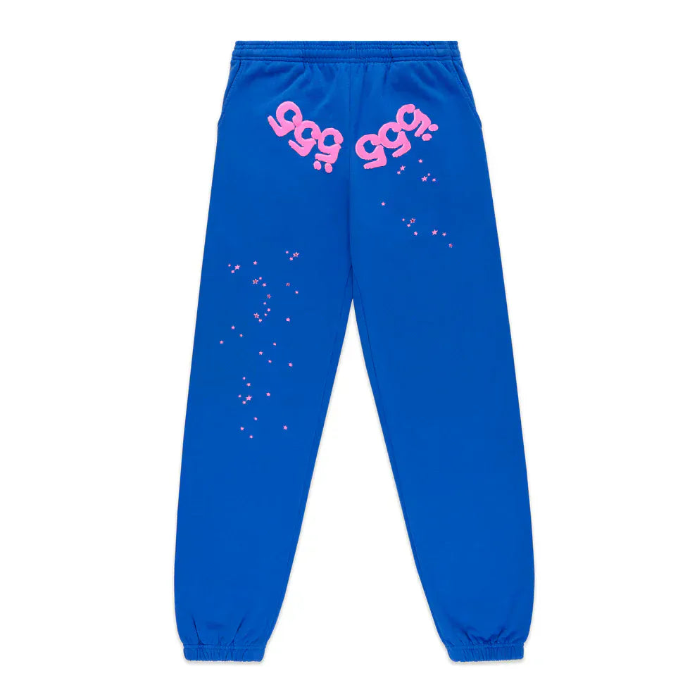 The 100% Cotton Sp5der Sweatpants are unisex blue jogger pants with a pink logo and star accents, elastic waistband and cuffs. Featuring a relaxed fit, these standout streetwear joggers bring comfort and style to any casual look.