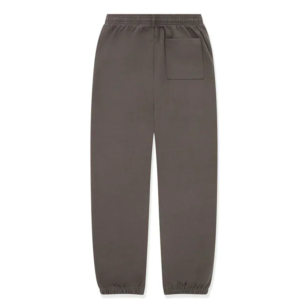 Sp5der Sweatpants—Unisex dark grey cotton joggers with a green side logo and star print, featuring an elastic waistband, cuffs, and a front right patch pocket for laid-back streetwear style.