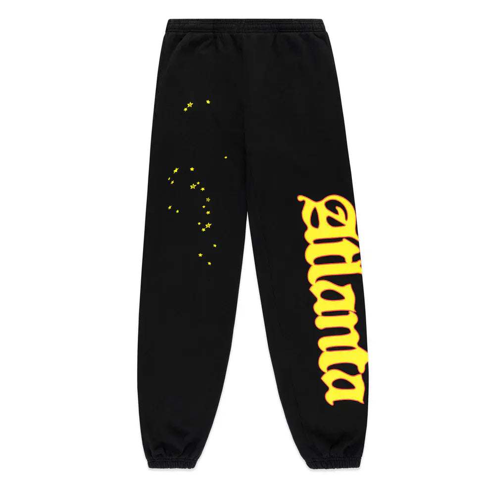 The Sp5der Sweatpants are unisex black cotton joggers with a flame side logo, star print details, and bold streetwear styling—perfect for standout casual looks.