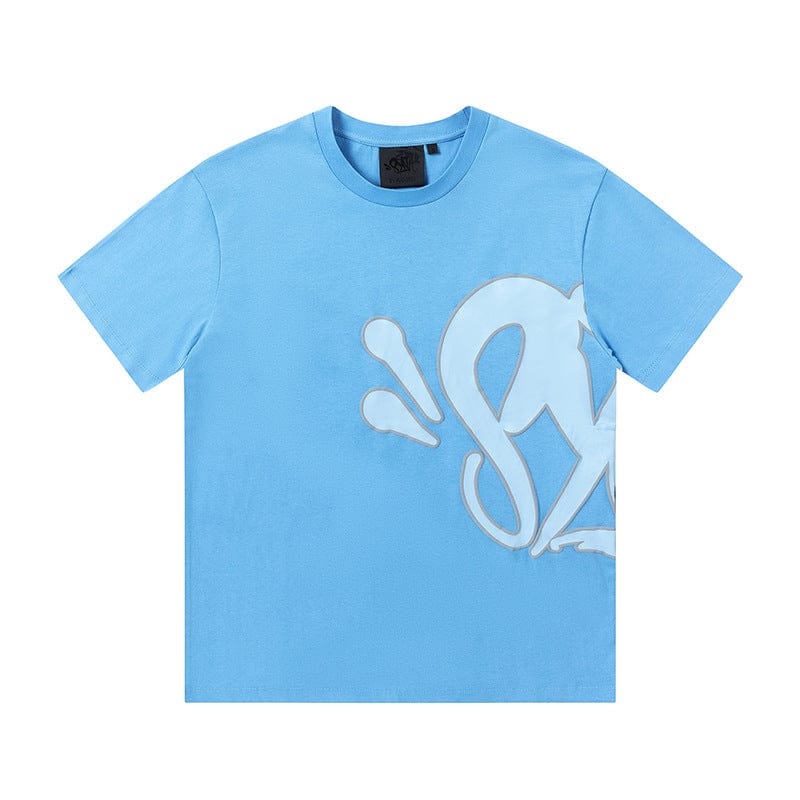 The Syna World Graphic T-Shirt is a light blue short-sleeve streetwear tee with a large white abstract graphic on the lower right, ideal for fans of bold graphic designs. Available in 8 colors.